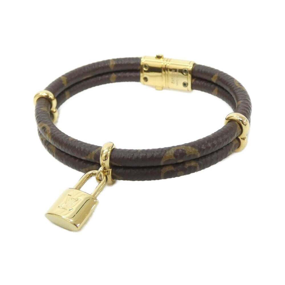 LOUIS VUITTON Brown Monogram Charm Bracelet - Picture 1 of 5